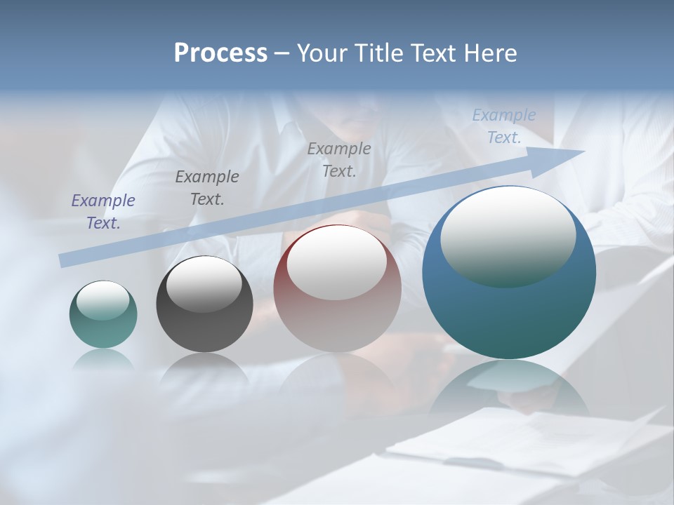 A Man And A Woman Sitting At A Table Looking At A Computer Screen PowerPoint Template