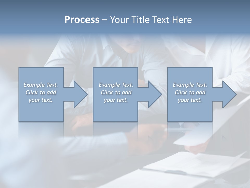 A Man And A Woman Sitting At A Table Looking At A Computer Screen PowerPoint Template