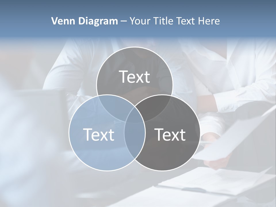A Man And A Woman Sitting At A Table Looking At A Computer Screen PowerPoint Template