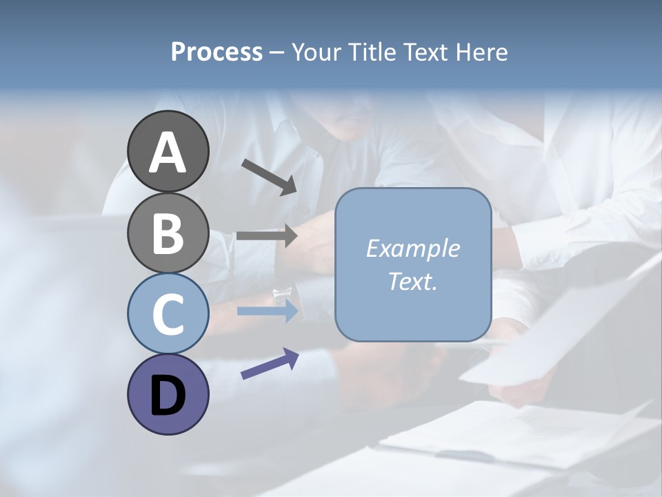A Man And A Woman Sitting At A Table Looking At A Computer Screen PowerPoint Template