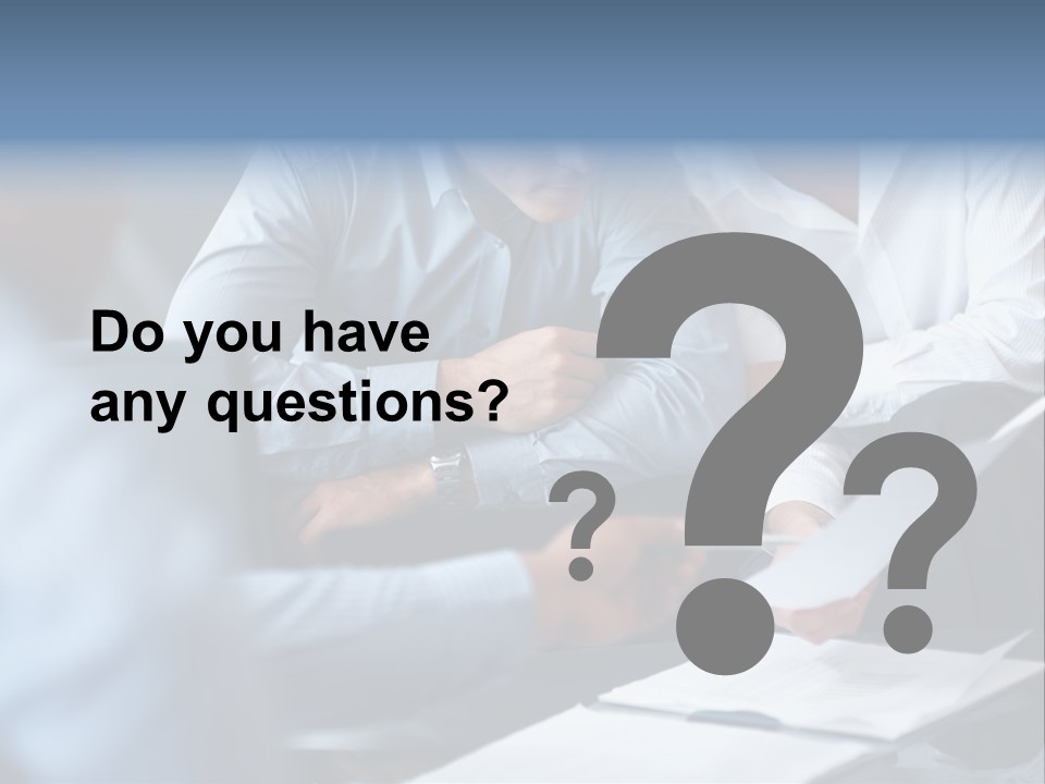 A Man And A Woman Sitting At A Table Looking At A Computer Screen PowerPoint Template