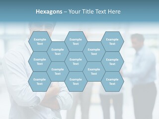 A Man Standing In Front Of A Group Of People PowerPoint Template