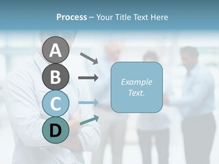 A Man Standing In Front Of A Group Of People PowerPoint Template