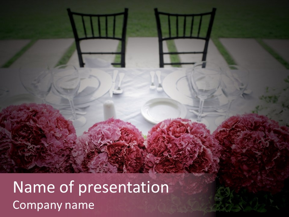 A Table Topped With Pink Flowers And Plates PowerPoint Template