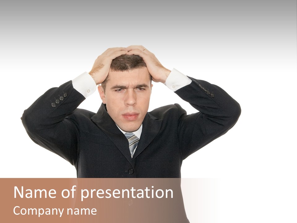 A Man In A Suit Holding His Hands To His Head PowerPoint Template