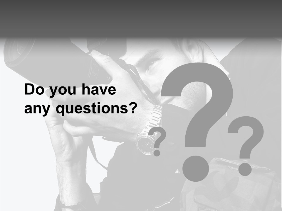 A Man Is Holding A Camera And Taking A Picture PowerPoint Template