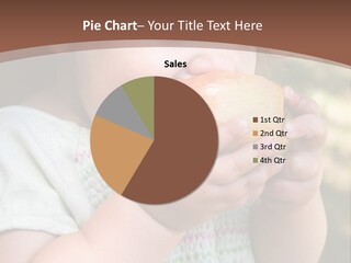 A Little Girl Holding An Apple In Her Hands PowerPoint Template
