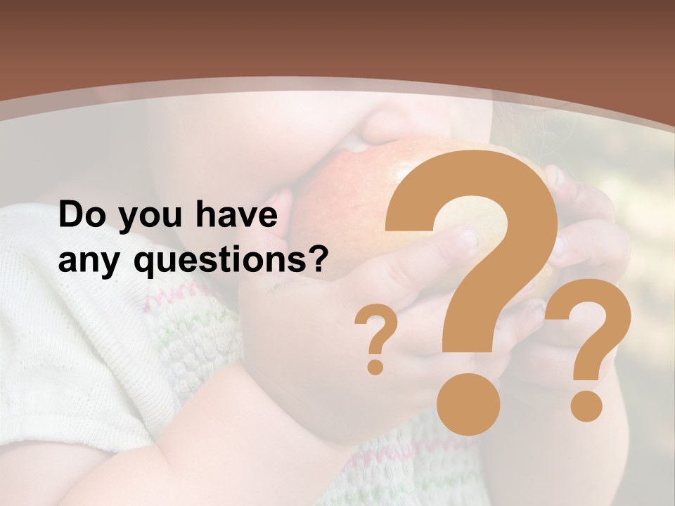 A Little Girl Holding An Apple In Her Hands PowerPoint Template