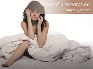 A Woman Sitting On A Bed Talking On A Cell Phone PowerPoint Template