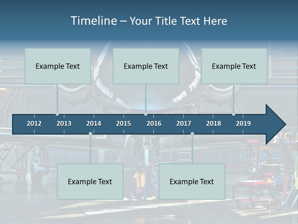 A Plane Is Parked Inside Of A Hangar PowerPoint Template