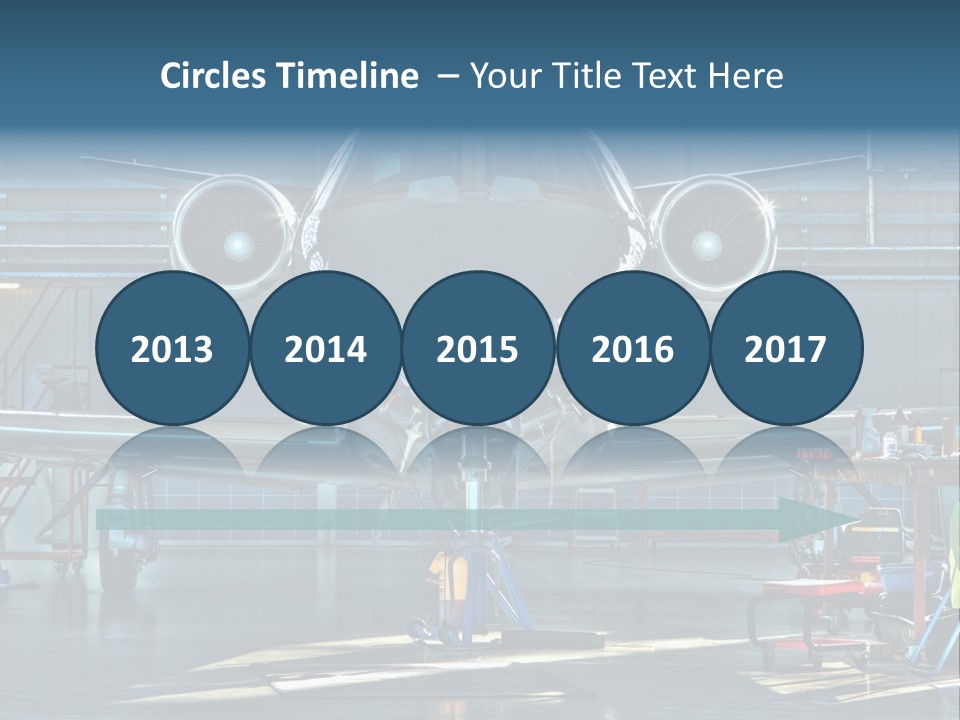 A Plane Is Parked Inside Of A Hangar PowerPoint Template