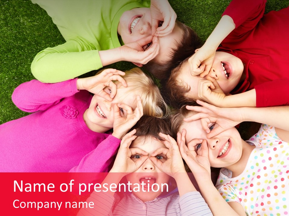 A Group Of Children Laying In A Circle On The Grass PowerPoint Template