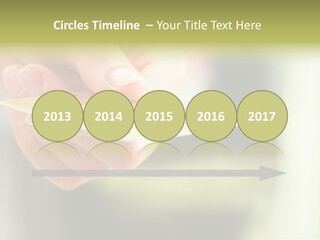 A Person Holding A Credit Card In Their Hand PowerPoint Template