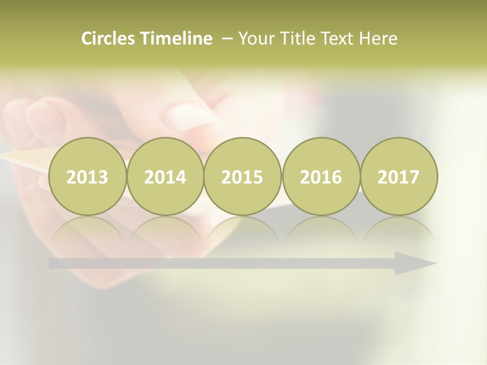 A Person Holding A Credit Card In Their Hand PowerPoint Template