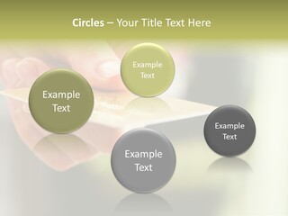 A Person Holding A Credit Card In Their Hand PowerPoint Template
