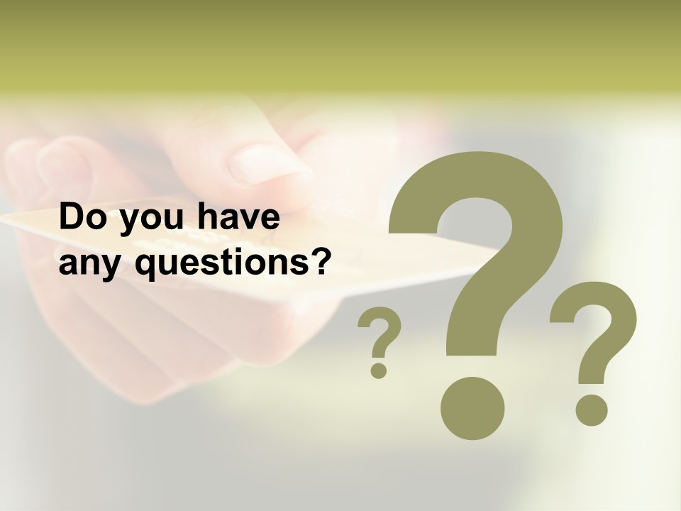 A Person Holding A Credit Card In Their Hand PowerPoint Template