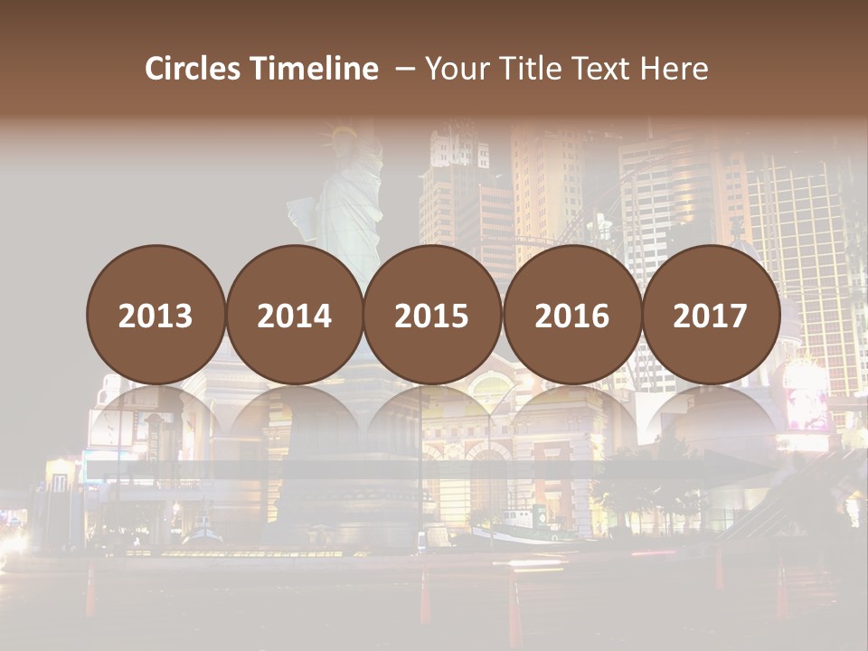 The Statue Of Liberty Is Lit Up At Night PowerPoint Template