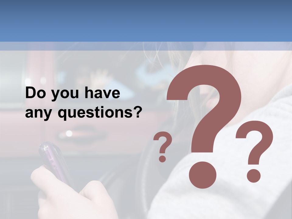 A Girl Is Texting On Her Phone While Driving A Car PowerPoint Template