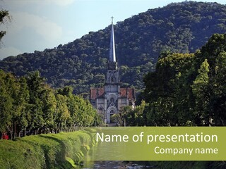 A Church On A Hill With A River In Front Of It PowerPoint Template