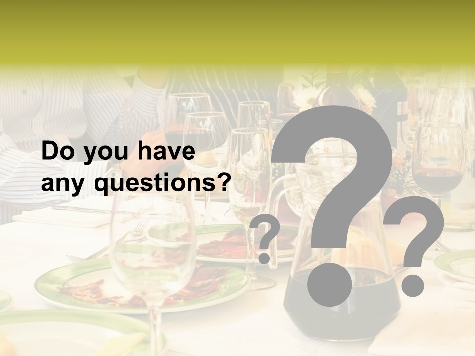 A Group Of People Sitting At A Table With Wine Glasses PowerPoint Template