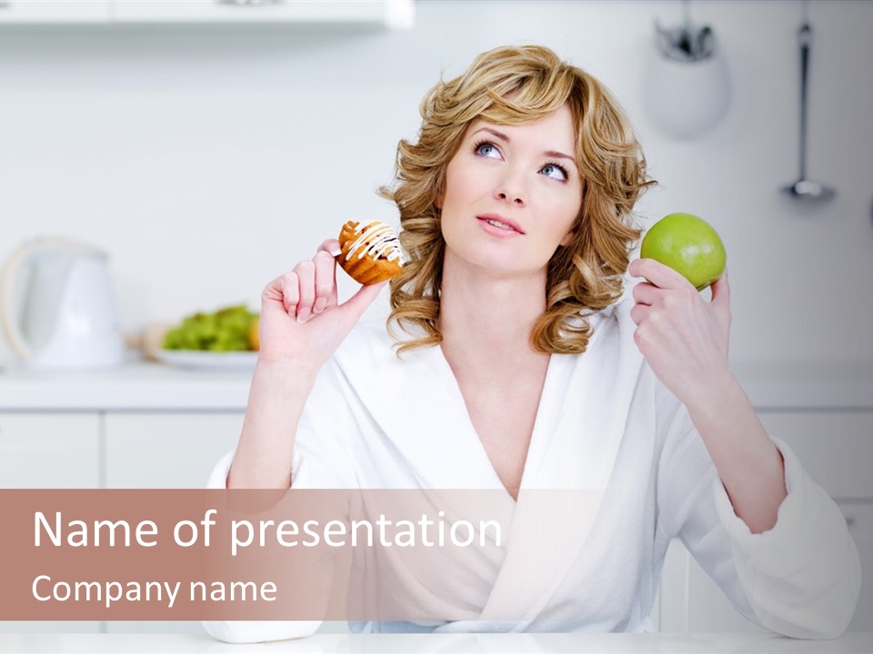 A Woman Is Holding A Cupcake And An Apple PowerPoint Template