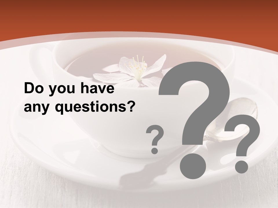 A Cup Of Tea On A Saucer With A Spoon PowerPoint Template