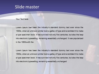 A Man Standing Next To A Machine In A Factory PowerPoint Template