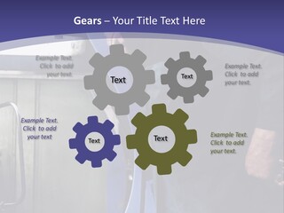 A Man Standing Next To A Machine In A Factory PowerPoint Template
