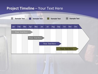 A Man Standing Next To A Machine In A Factory PowerPoint Template