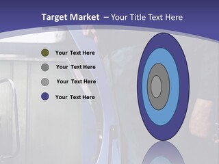 A Man Standing Next To A Machine In A Factory PowerPoint Template