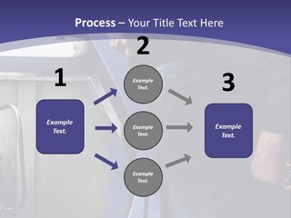 A Man Standing Next To A Machine In A Factory PowerPoint Template