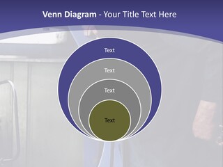 A Man Standing Next To A Machine In A Factory PowerPoint Template