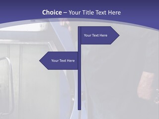 A Man Standing Next To A Machine In A Factory PowerPoint Template