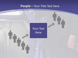 A Man Standing Next To A Machine In A Factory PowerPoint Template