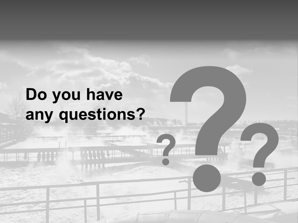 A Black And White Photo Of A Factory With Steam Coming Out Of It PowerPoint Template