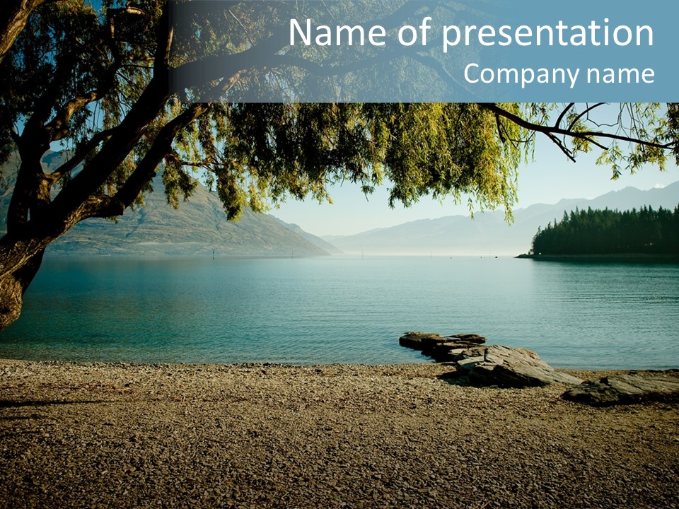 A Large Body Of Water Surrounded By Trees PowerPoint Template