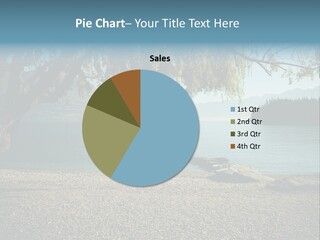 A Large Body Of Water Surrounded By Trees PowerPoint Template