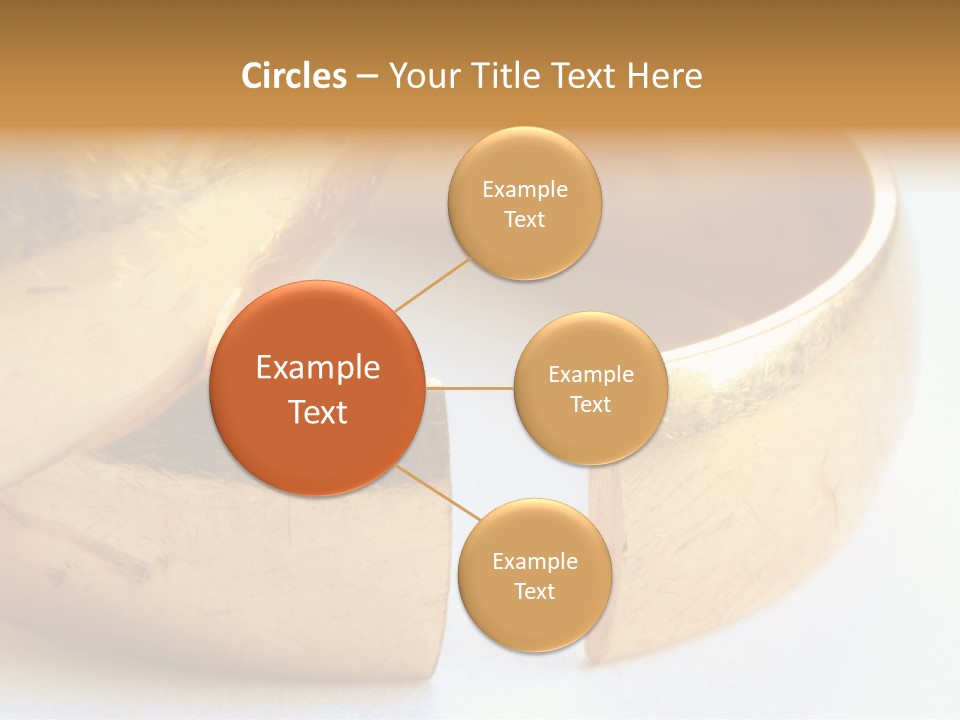 A Couple Of Gold Rings Sitting On Top Of Each Other PowerPoint Template