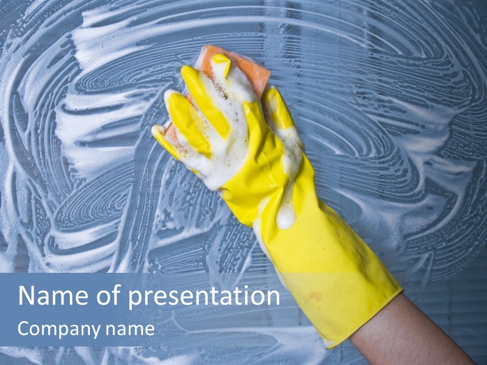 A Hand With Yellow Gloves Holding A Sponge Powerpoint Template PowerPoint Template
