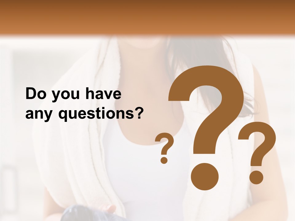 A Woman In A Towel Holding A Water Bottle PowerPoint Template