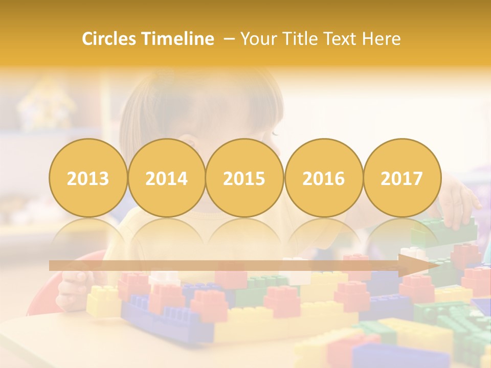 A Little Girl Playing With Legos At A Table PowerPoint Template