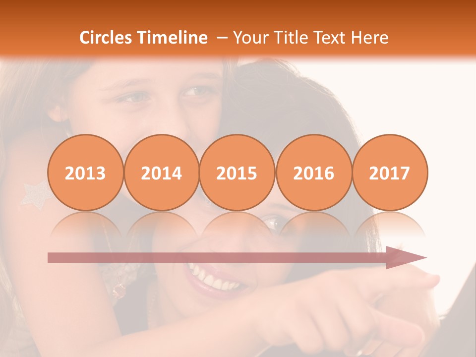 Two Girls Are Looking At A Laptop Screen PowerPoint Template