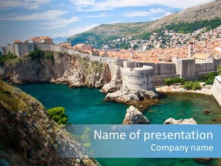 A Castle On A Cliff Overlooking The Water PowerPoint Template