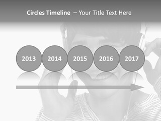 A Young Man Wearing Headphones Is Smiling PowerPoint Template