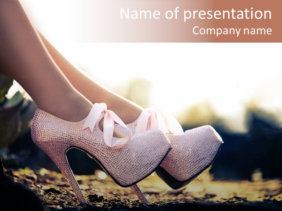 A Woman's High Heeled Shoe With A Pink Bow PowerPoint Template