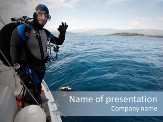 A Man In Scuba Gear Standing On A Boat PowerPoint Template