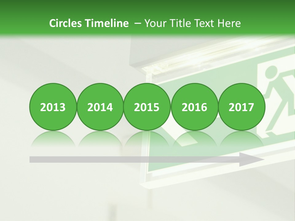 A Green And White Sign Hanging From A Ceiling PowerPoint Template