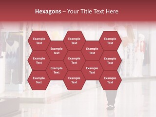 A Man Walking Down A Shopping Mall Holding A Shopping Bag PowerPoint Template