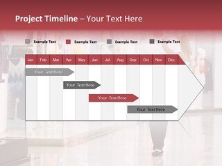 A Man Walking Down A Shopping Mall Holding A Shopping Bag PowerPoint Template