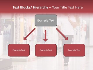 A Man Walking Down A Shopping Mall Holding A Shopping Bag PowerPoint Template